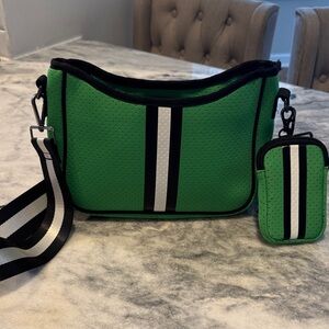 HAUTE SHORE Green Crossbody Bag with Black and White Accents